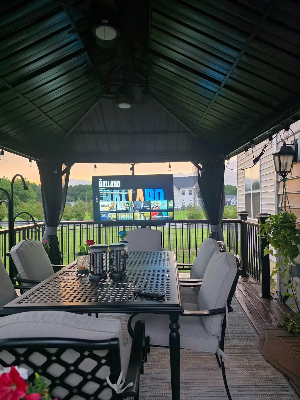A covered deck, made for entertainment.